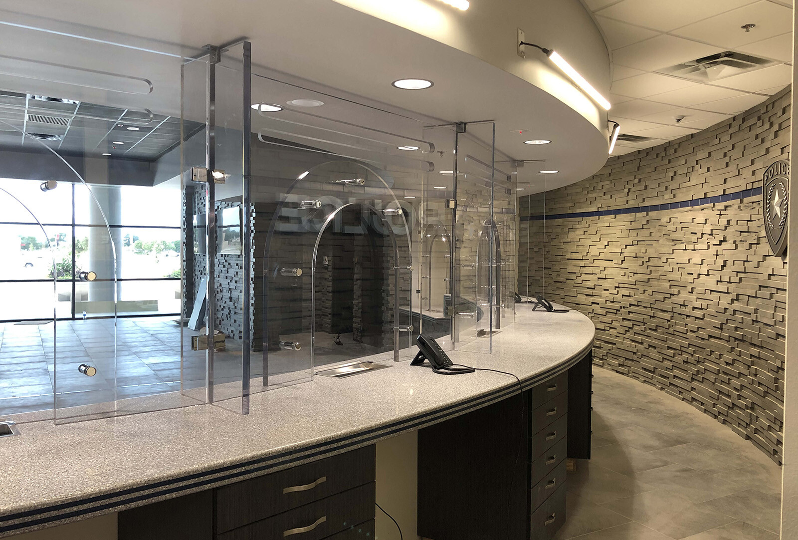 An example of bullet-resistant counters reinforced by ballistic fiberglass and engineered for a customer's exact specifications