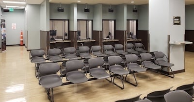 An example of a facility that can benefit from test methods defined by the ASTM F1915 standard to deter and give staff time to respond during a physical attack.