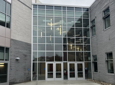 An example of a building where you could combine security window film, tested to the ASTM E1886 standard, with ballistic protection as part of a layered security strategy