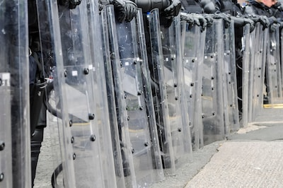 A row of riot shields, which can be one application of the NIJ 0108.01 ballistic standard.