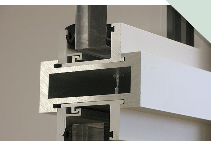 An example of an aluminum glass frame for a ballistic barrier system