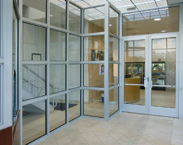 A photo showcasing the use of bullet proof window and door glass versus shatterproof glass or ordinary glass to curb forced entry attempts or break-ins and also stop bullets